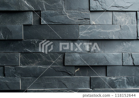 Dark gray slate wall cladding background, the texture of a natural stone panel for interior or exterior decoration. 118152644