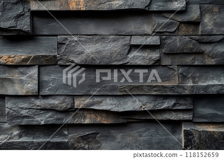 Dark gray slate wall cladding background, the texture of a natural stone panel for interior or exterior decoration. Dark gray slate wall cladding background, the texture of a natural stone panel for interior or exterior decoration. 118152659