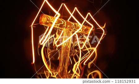 Macro detailed incandescent Edison Tungsten filament lamp flickering, vintage retro bulb. Energy, electricity, innovation. Electric power. 118152931
