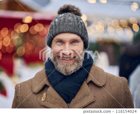 Winter Portrait of Happy Handsome Man Smiling Outdoors Winter Portrait of Happy Handsome Man Smiling Outdoors 118154024