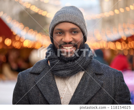 Winter Portrait of Happy Handsome Man Smiling Outdoors 118154025