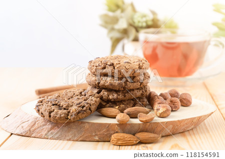Oatmeal Cookies with Almonds and a Cup of Tea Oatmeal Cookies with Almonds and a Cup of Tea 118154591