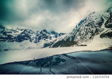 Frozen Lake Morskie Oko or Sea Eye Lake in Poland at Winter. 118154704