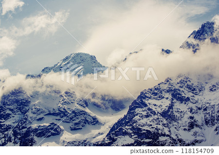 Mountain peaks near Morskie Oko or Sea Eye Lake in Poland at Winter. Tatras range Mountain peaks near Morskie Oko or Sea Eye Lake in Poland at Winter. Tatras range 118154709