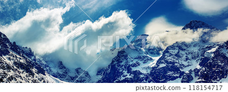 Mountain peaks near Morskie Oko or Sea Eye Lake in Poland at Winter. Tatras range Mountain peaks near Morskie Oko or Sea Eye Lake in Poland at Winter. Tatras range 118154717
