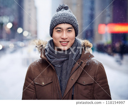 Winter Portrait of Happy Handsome Man Smiling Outdoors 118154997