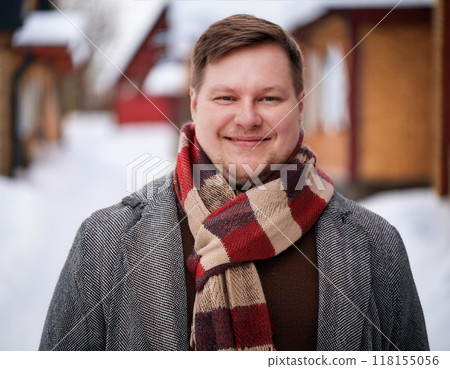 Winter Portrait of Happy Handsome Man Smiling Outdoors Winter Portrait of Happy Handsome Man Smiling Outdoors 118155056