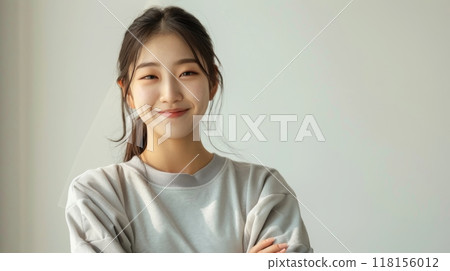 Asian Woman Smiling, Confident Posing in Casual Attire for Fitness, Health, Lifestyle, Diversity, Stock Photography 118156012