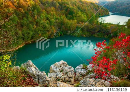 Autumn colors and lake of Plitvice National Park in Croatia, seasonal colorful background Autumn colors and lake of Plitvice National Park in Croatia, seasonal colorful background 118156139