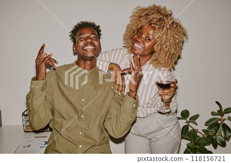 Portrait of young people spending leisure time together and drinking wine 118156721
