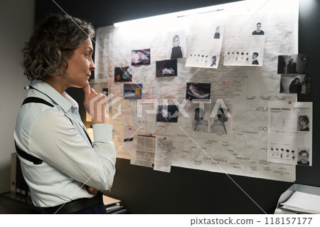 Analyzing Crime Evidence in Detective's Office Setting 118157177