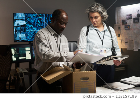 Collaborating Investigators in Office Reviewing Documents 118157199