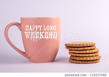 Happy Long Weekend. Motivational text on a coffee mug Happy Long Weekend. Motivational text on a coffee mug 118157488