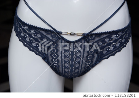 Closeup of blue cheeky on mannequin in a fashion store showroom 118158201