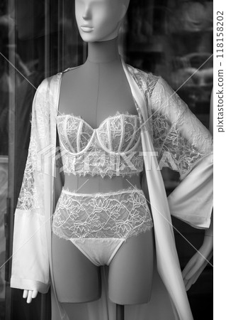 closeup of white lingerie on mannequin in underwear fashion store showroom closeup of white lingerie on mannequin in underwear fashion store showroom 118158202