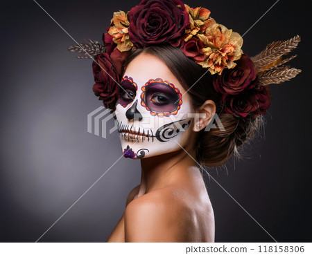 Day of the Dead Portrait of Woman with Skull and Bone Mask and Floral Hair Elements 118158306