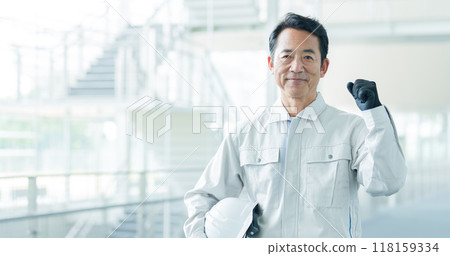Engineer doing a fist pump 118159334