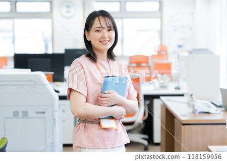 Young woman working in the office Young woman working in the office 118159956
