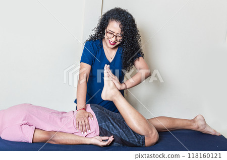 Physiotherapy rehabilitation concept, Physiotherapist with patient, Lumbar Physiotherapy. Physiotherapy rehabilitation concept, Physiotherapist with patient, Lumbar Physiotherapy. 118160121