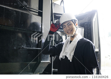 Man inspecting a truck Man inspecting a truck 118160426