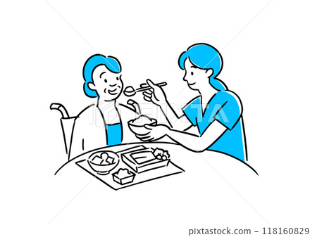 Caregivers helping seniors with meals 118160829