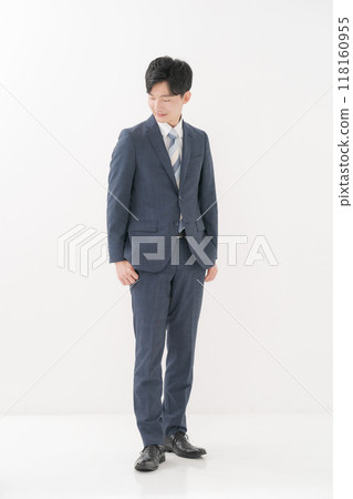 Standing man in suit 118160955