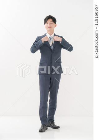 Standing man in suit 118160957