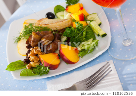 Salad with roasted chicken hearts Salad with roasted chicken hearts 118162556