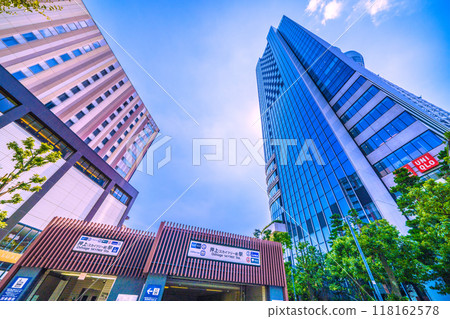 Tokyo cityscape in Japan, with a view of Oshiage Station and the Tokyo Skytree standing out against the greenery (September 6th) 118162578