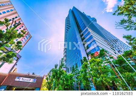 Tokyo cityscape in Japan, with a view of Oshiage Station and the Tokyo Skytree standing out against the greenery (September 6th) Tokyo cityscape in Japan, with a view of Oshiage Station and the Tokyo Skytree standing out against the greenery (September 6th) 118162583