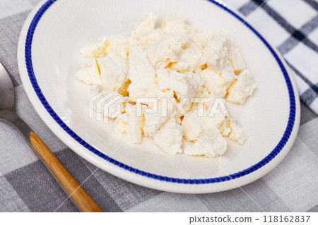 Delicious fresh young cheese on plate Delicious fresh young cheese on plate 118162837