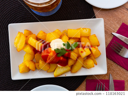 Spanish dish Patatas bravas with hot sauce Spanish dish Patatas bravas with hot sauce 118163021
