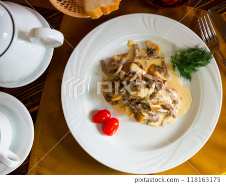Image of a popular meat dish made called Swiss beefstroganoff. Image of a popular meat dish made called Swiss beefstroganoff. 118163175