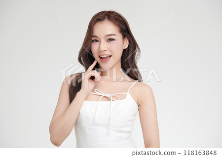 Beautiful young asian woman with clean fresh skin on white background, Face care, Facial treatment, Cosmetology, beauty and spa, Asian women portrait. Beautiful young asian woman with clean fresh skin on white background, Face care, Facial treatment, Cosmetology, beauty and spa, Asian women portrait. 118163848