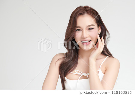 Beautiful young asian woman with clean fresh skin on white background, Face care, Facial treatment, Cosmetology, beauty and spa, Asian women portrait. Beautiful young asian woman with clean fresh skin on white background, Face care, Facial treatment, Cosmetology, beauty and spa, Asian women portrait. 118163855