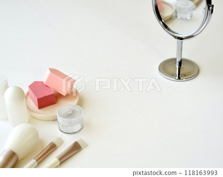 Mirror and makeup tools on white background Mirror and makeup tools on white background 118163993