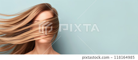 Photo Of Woman With Long Blonde Hair Flowing In The Wind On A Light Blue Background, Symbolizing Natural Beauty And Healthy Skin For Product Presentation. Web Banner With Copy Space Photo Of Woman With Long Blonde Hair Flowing In The Wind On A Light Blue Background, Symbolizing Natural Beauty And Healthy Skin For Product Presentation. Web Banner With Copy Space 118164985