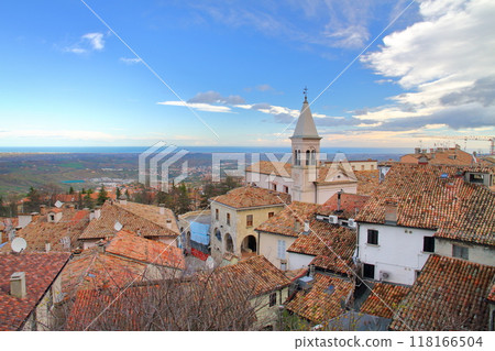 Republic of San Marino in Italy: View of the old town of Borgo Maggiore, a World Heritage Site at the foot of Mount Titano, and the Adriatic Sea Republic of San Marino in Italy: View of the old town of Borgo Maggiore, a World Heritage Site at the foot of Mount Titano, and the Adriatic Sea 118166504
