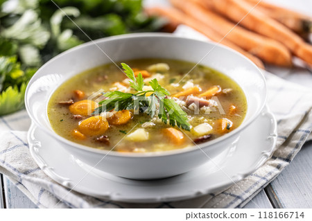 Soup made from barley groats, smoked pork neck, potatoes and root vegetables Soup made from barley groats, smoked pork neck, potatoes and root vegetables 118166714
