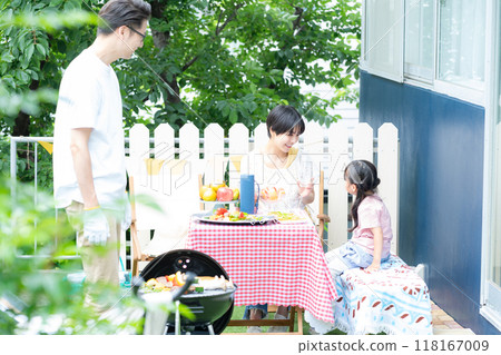 Family enjoying a barbecue Family enjoying a barbecue 118167009
