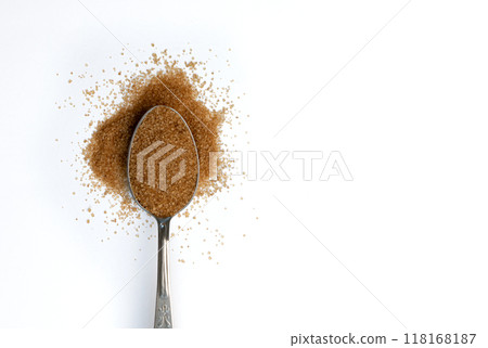 cane sugar in spoon isolated on white background cane sugar in spoon isolated on white background 118168187