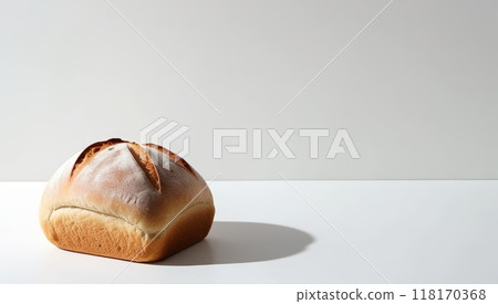 warm, golden-brown loaf of freshly baked bread 118170368