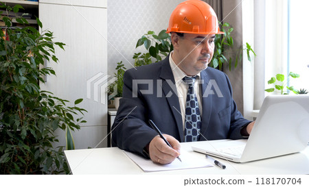 A Man in Suit and Hard Hat Working with Project Documentation A Man in Suit and Hard Hat Working with Project Documentation 118170704
