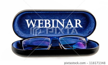 WEBINAR words written on the glasses case on a white background WEBINAR words written on the glasses case on a white background 118171348