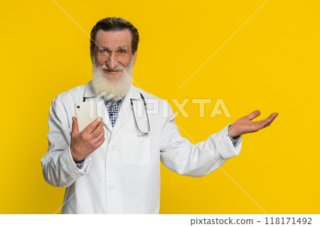 Doctor man using smartphone show point empty place, advertising application area, positive feedback Doctor man using smartphone show point empty place, advertising application area, positive feedback 118171492