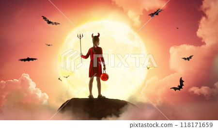 girl in devil costume at Halloween 118171659