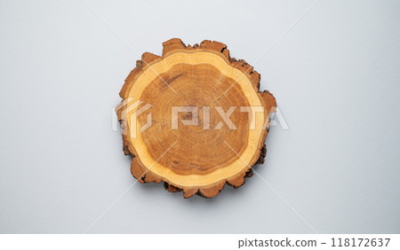 Modern empty product display. Minimal wooden round board on a gray background.  118172637