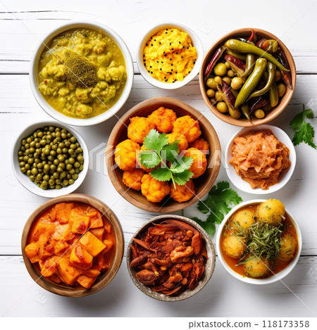 Different bowls with assorted indian food on white wooden background, top view. 118173358