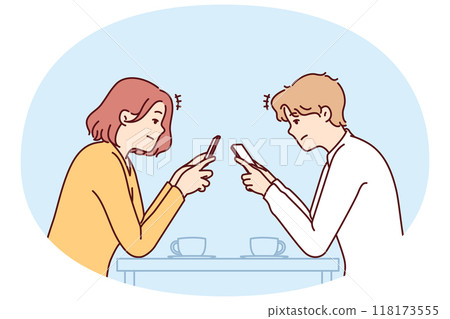 Couple with phones sits in cafe, addiction to social networks, not paying attention to interlocutor Couple with phones sits in cafe, addiction to social networks, not paying attention to interlocutor 118173555