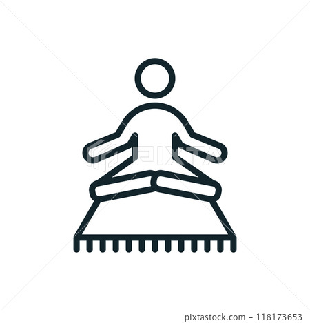 Person meditating in lotus position on a mat for mental health 118173653
